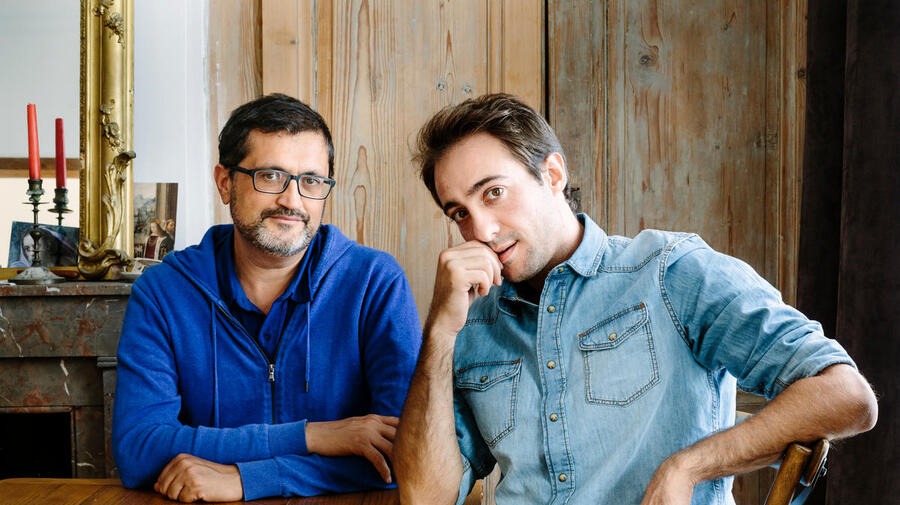 France. Lucien hosts Hussam, a refugee from Syria, in Lyon. This portrait is part of the No Stranger Place series, which portrays locals and refugees living together