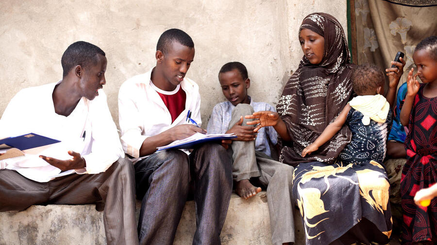 Kenya / Somali Refugees / Hagadera Dadaab Camp / School teachers on their break were recruited as data collectors for the nothing but nets mosquito net coverage surveys. Here the data collectors interview the head of household. / UNHCR / S. Hoibak / December 2010