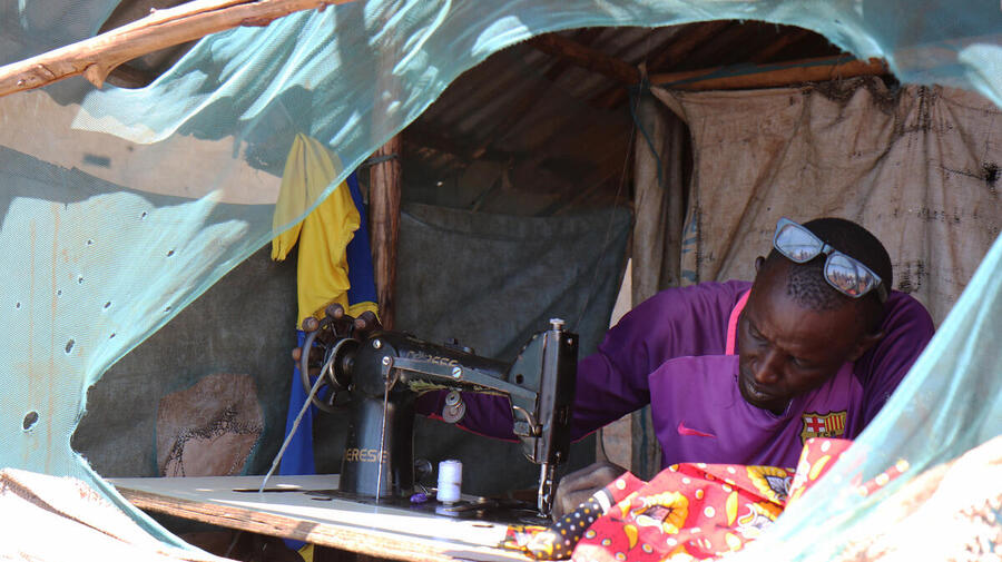 Ethiopia. Refugee tailor sews hope for children