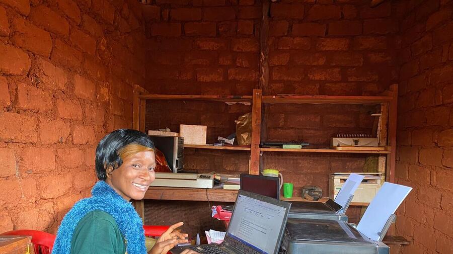 Tanzania. Rehema with her colleague at the computer shop