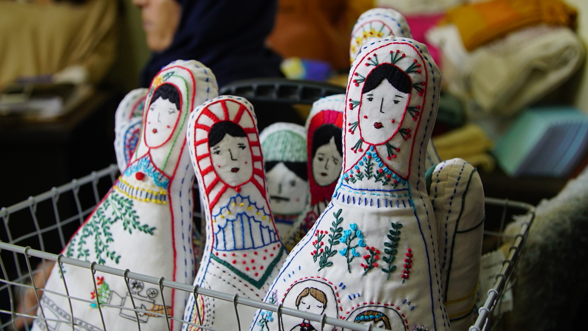 Lebanon. Embroiding dreams and hopes of Syrian mothers in war-torn Aleppo on stuffed dolls