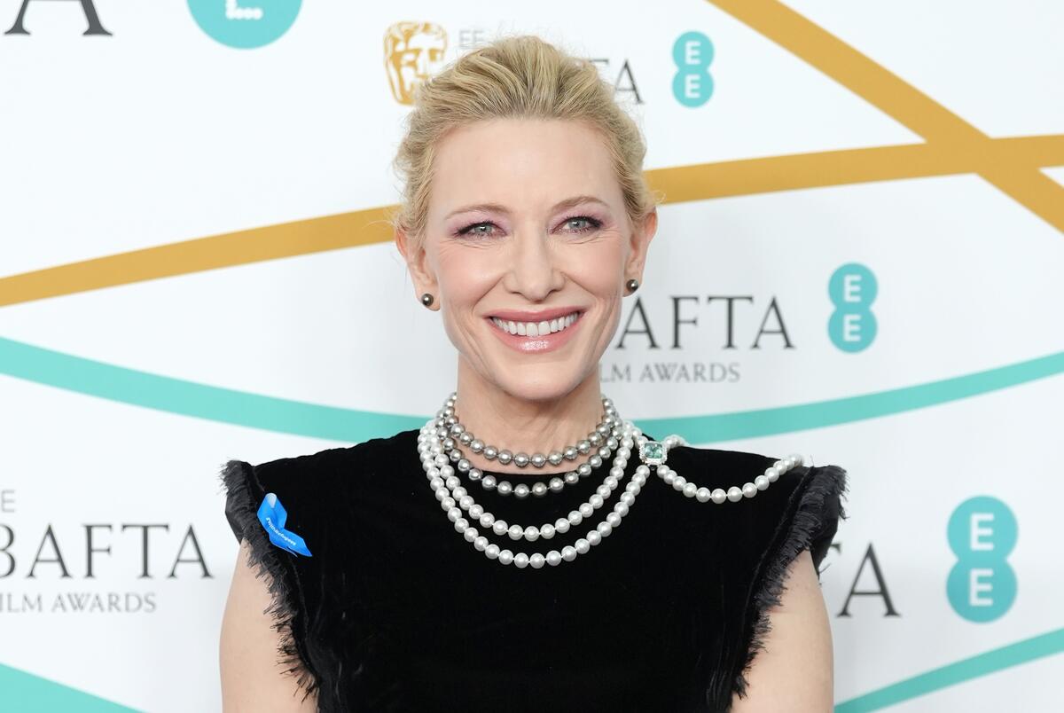 United Kingdom. UNHCR Goodwill Ambassador Cate Blanchett wearing a blue ribbon in solidarity with refugees at the EE BAFTA Film Awards 2023.