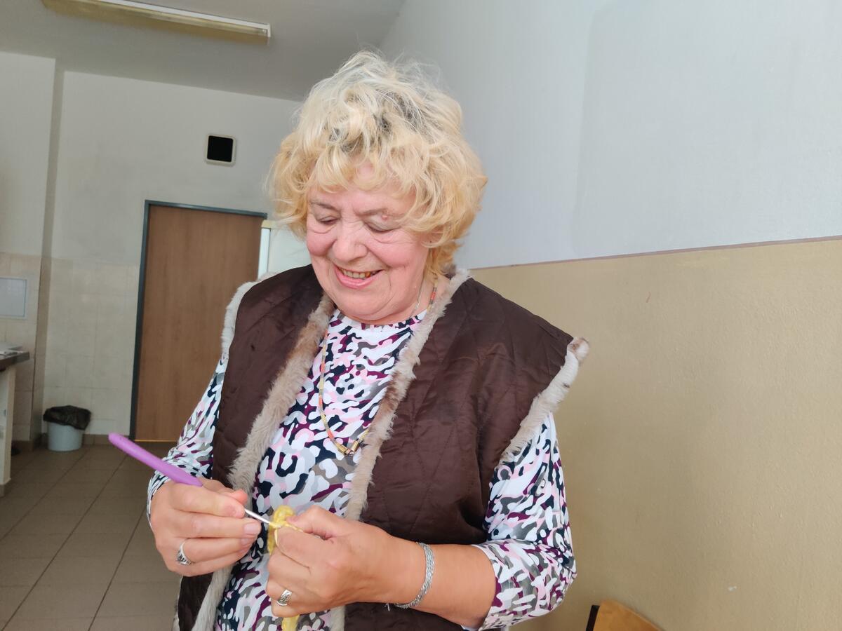 Slovakia. Albina, a refugee from Ukraine who has found safety in the town Humenné, sings and knits while recalling her youth and peaceful life in Ukraine.
