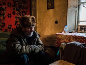 Ukraine. A man visits his neighbor near the front line