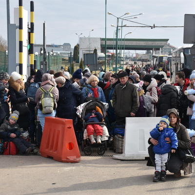  People fleeing Ukraine enter Poland at the Medyka border crossing. 