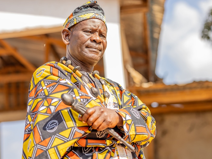 A man in a colorful outfit.