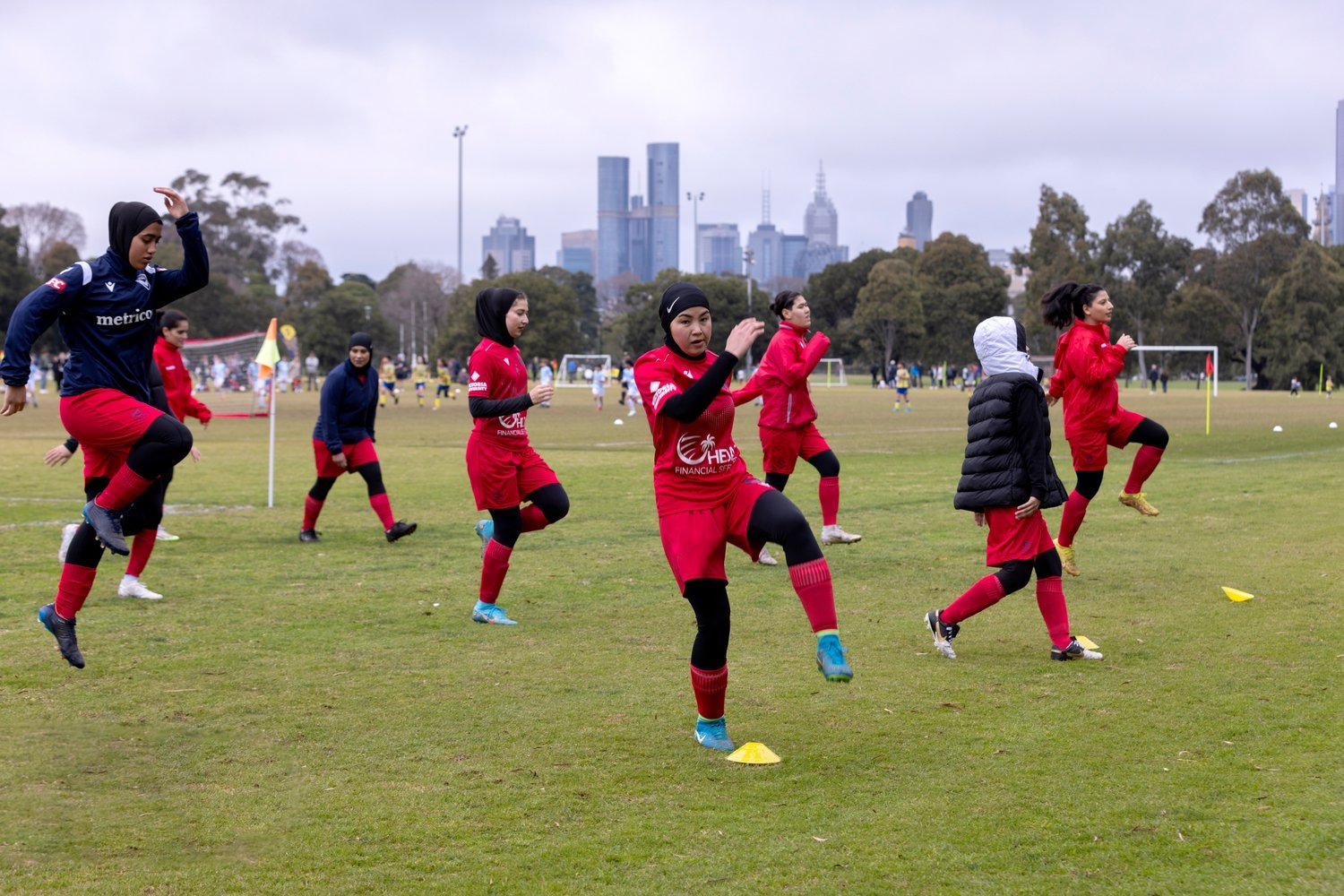 Women footballers training for a match.