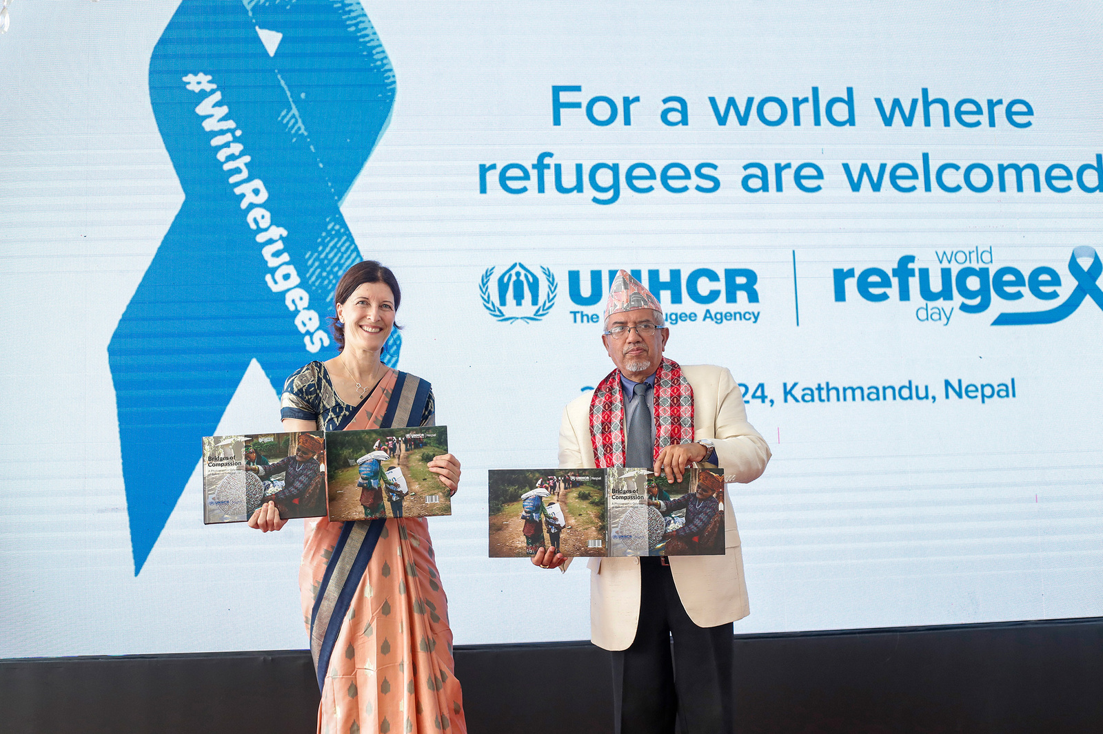 To commemorate the World Refugee Day 2024, UNHCR Nepal launched a photobook titled "Bridges of Compassion: A Photographic Odyssey of Refugees in Nepal" amidst a special event in Kathmandu on 20 June 2024.