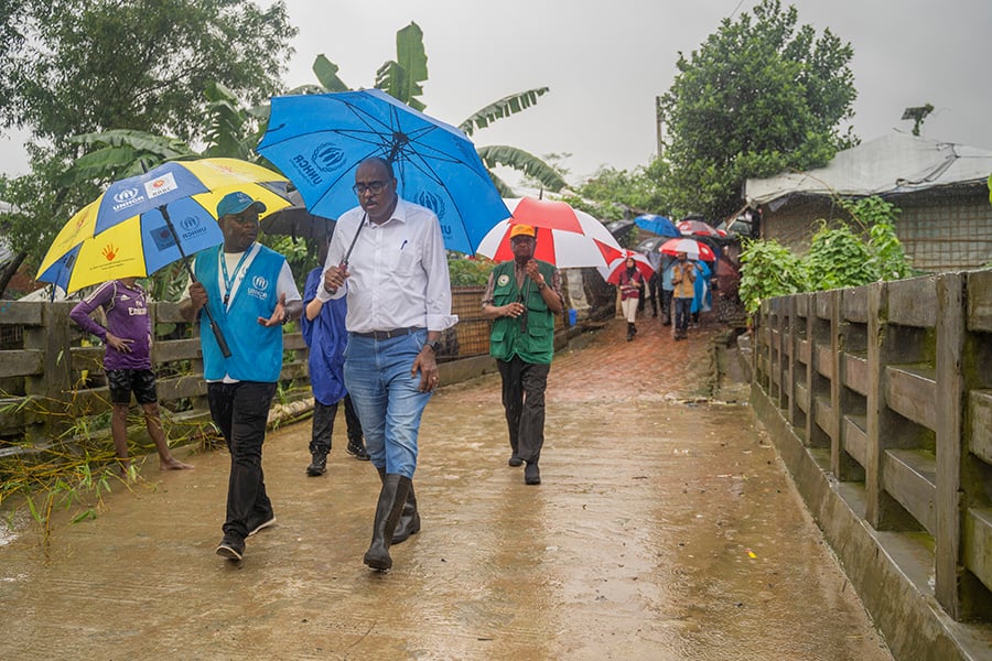 OIC Assistant Secretary General for Humanitarian Affairs, Ambassador Tariq Ali Bakheet, receives a briefing from a UNHCR staff on the deteriorating living conditions of refugees in the camps.