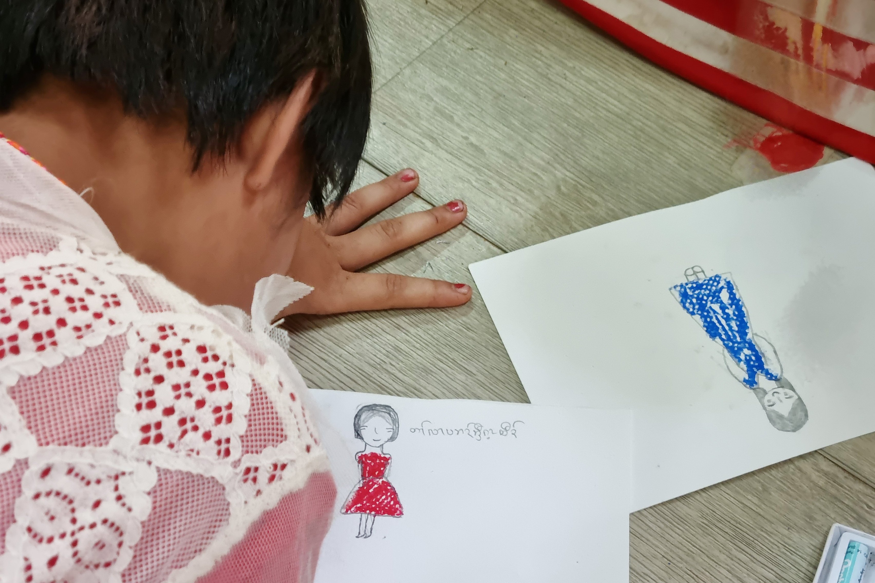 Refugee children from Myanmar in Tham Hin refugee camp attending a session on self-care and self-protection