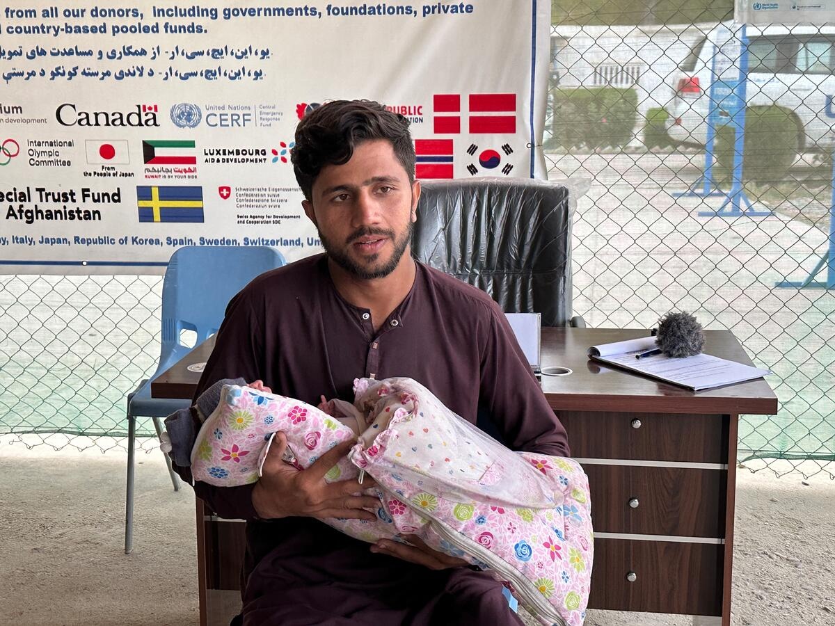 Abdul and his 28 day old son at a UNHCR centre in Samarkhel, Nangarhar.