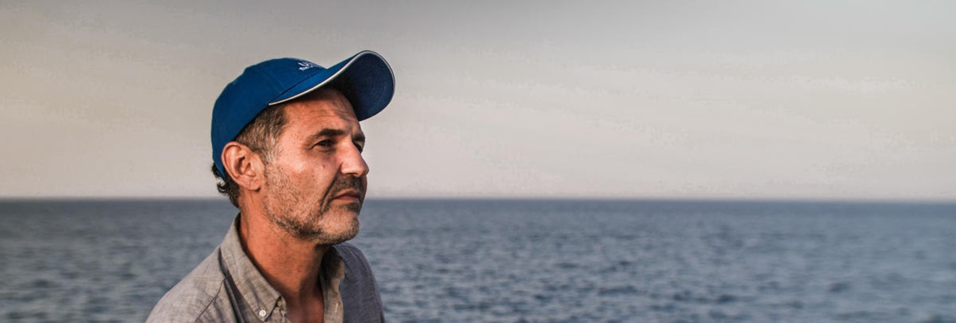 Italy. UNHCR Goodwill Ambassador Khaled Hosseini meets refugees who have survived the perilous sea crossing to Europe
