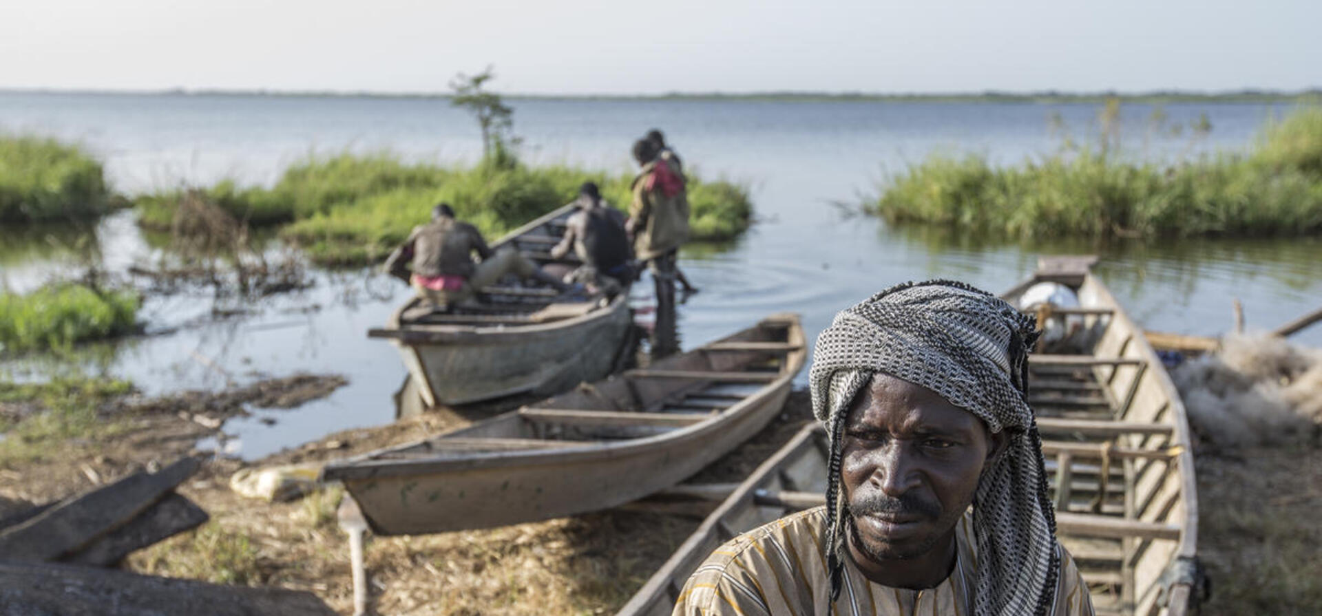 Chad. Nigerian refugees join local fishing community on shores of Lake Chad