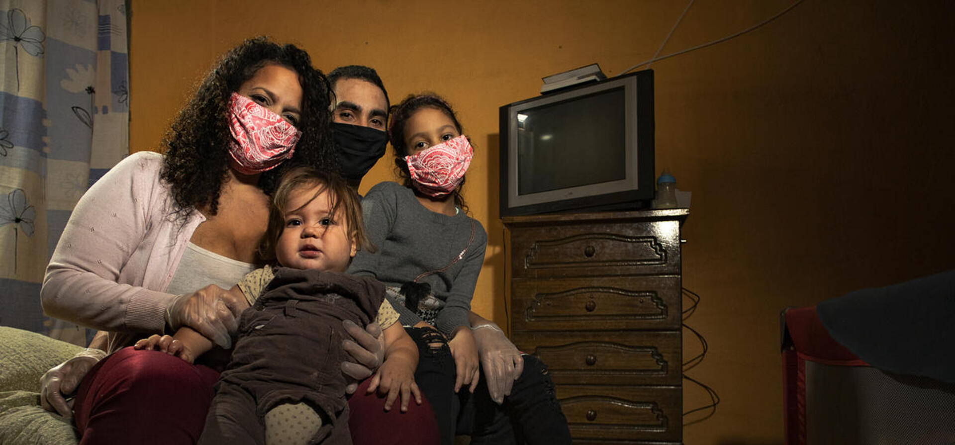 A displaced Venezuelan family who lost their income during COVID-19 pictured in their home in Santiago, Chile, in May 2020.