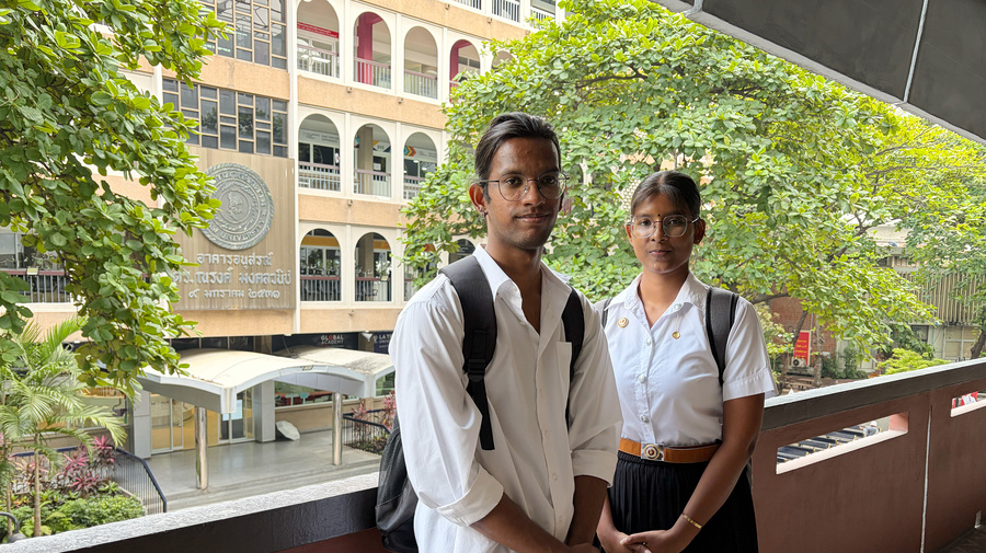 Danu (right) and TJ (left) Danu and TJ, Sri Lankan refugee students, stand at Siam University in Bangkok, where they completed their studies through DAFI scholarship programme supported by the German Government. 