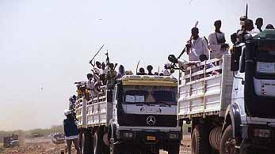 Eritrean refugees returning home from the Sudan last year.