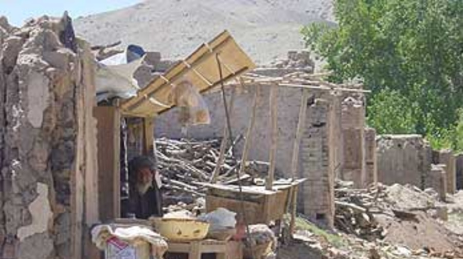 A returnee from Kabul runs one of the few opened shops in Estalef village in the Shomali Plain.