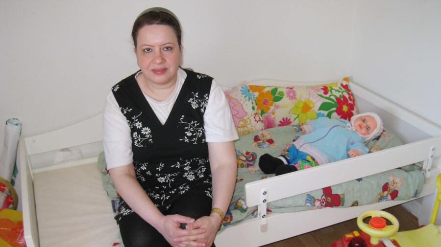 Sawsan in her new home in Iceland. The Akranes community has rallied around the newcomers.