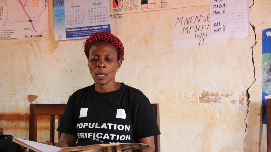 Mwavita Mlasi, in the office of the Executive Committee at Nyarugusu Refugee Camp, uses her position as vice president to help people find solutions to their problems.