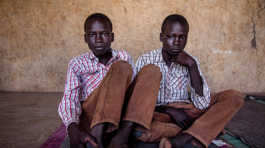 Kenya. South Sudan refugee twins Jacob and Simon, 14 in Kakuma Refugee Settlement