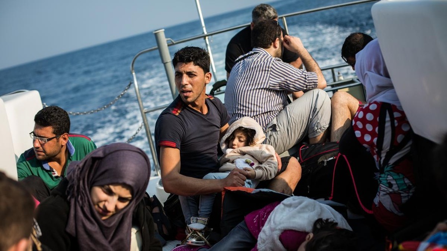 Syrian refugees on board a Hellenic Coast Guard vessel after being rescued in the Mediterranean sea, off the coast of Lesbos, Greece.