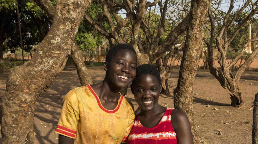 After growing up with no official nationality in an orphanage, now Françoise (left) and Christel are proud citizens of Cote d'Ivoire.