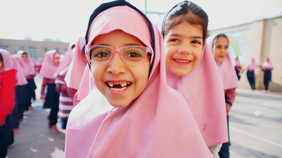 Iran. Afghan refugee sisters go to school for the first time