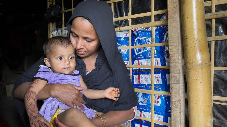 Bangladesh. Rohingya woman took shelter in her relative's home after losing everything in a recent fire at Kutupalong refugee settlement.