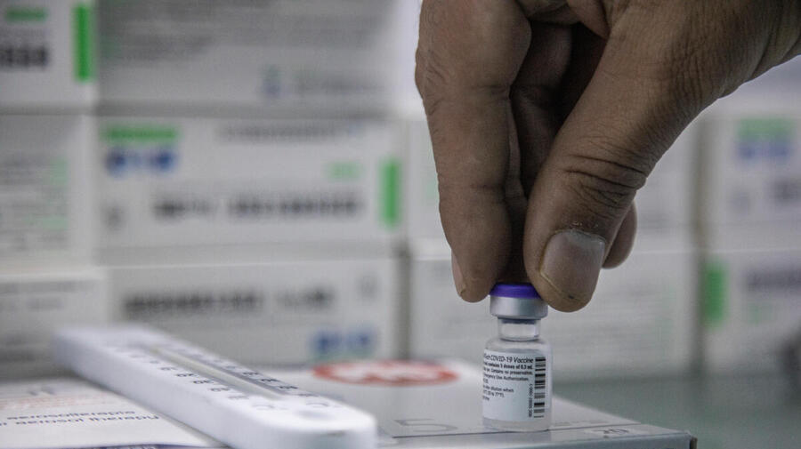 COVID-19 vaccines in cold storage .