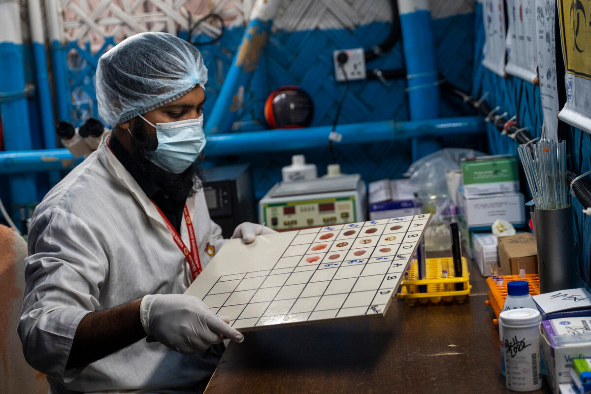 A lab technologist tests blood samples at a health care centre in Kutupalong refugee camp, Cox’s Bazar, Bangladesh.