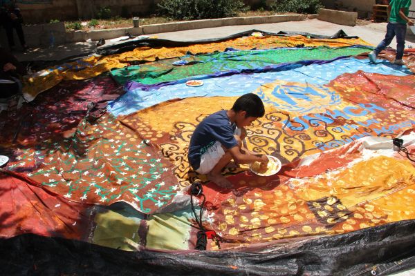 The artwork on this tent was inspired by the Austrian symbolist painter Gustav Klimt and the Syrian poet Nizar Qabbani.