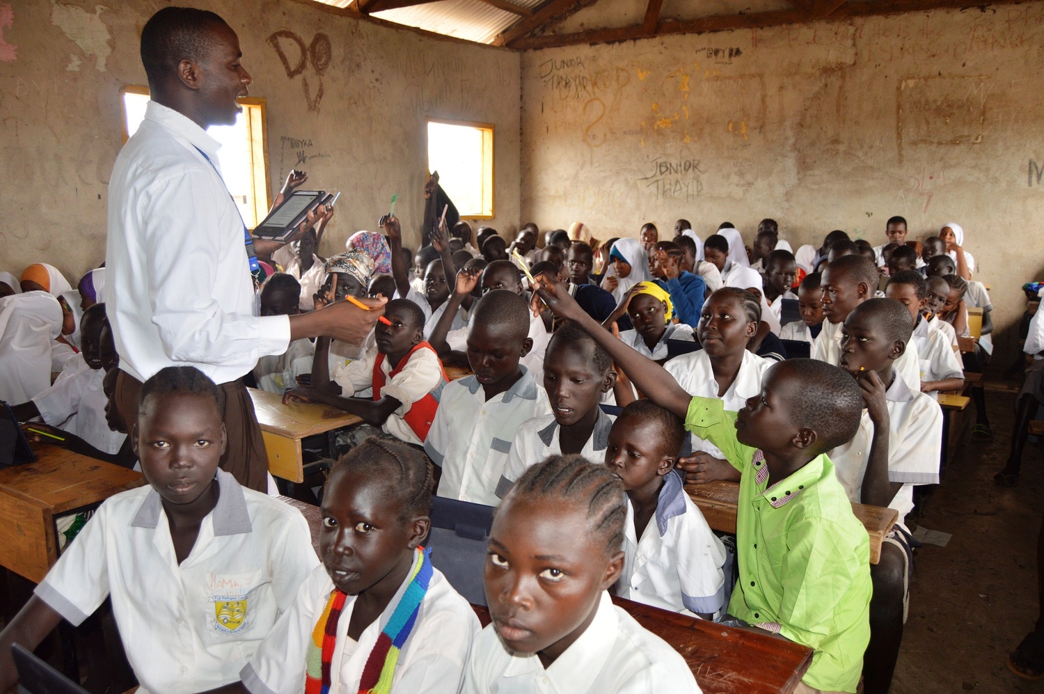 Kenya. Students using tablets under the Instant Network Schools project in Kakuma Refugee Camp