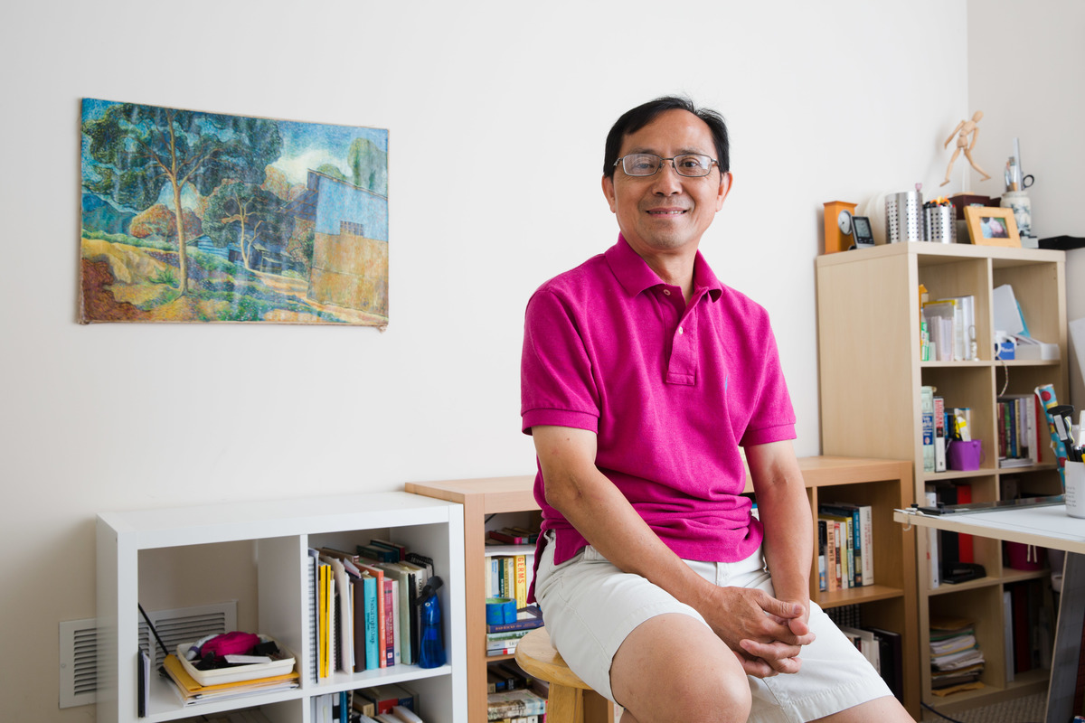 United States. Portrait of Thanh Dang at his home.