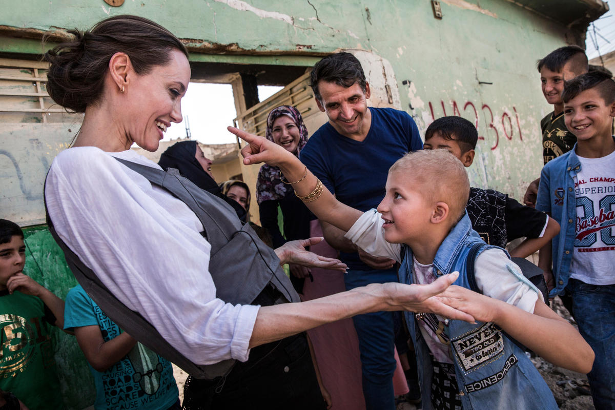 UNHCR Special Envoy Angelina Jolie in Mosul with an eight-year-old girl in West Mosul, Iraq
