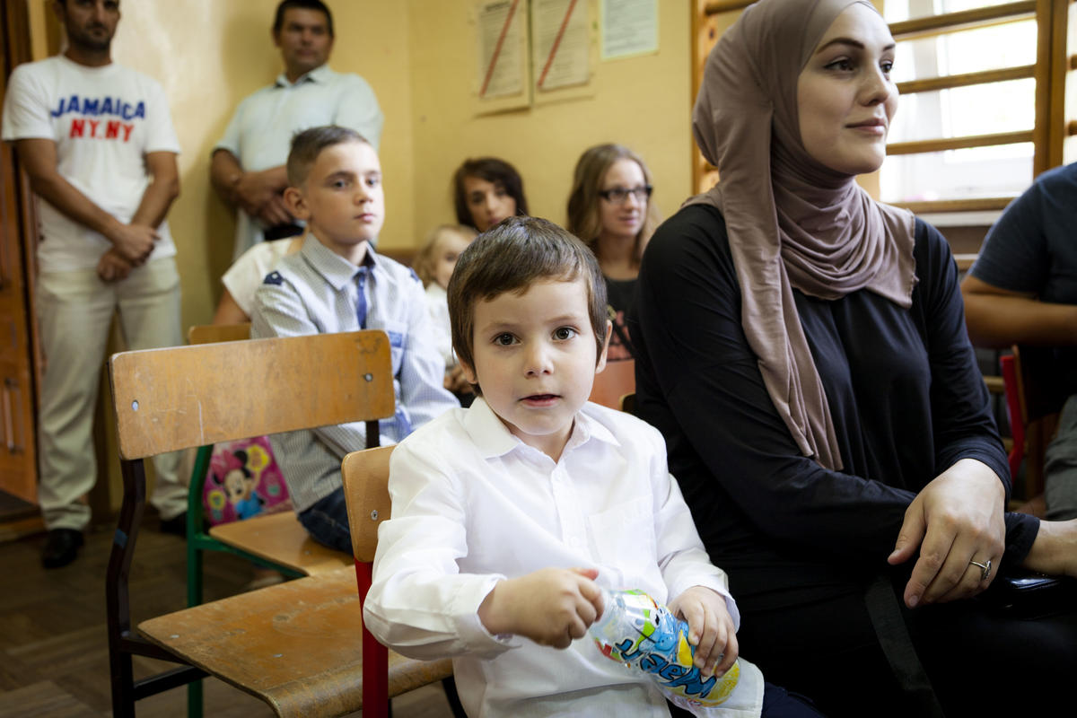 Poland. Chechen children mingle happily in village school
