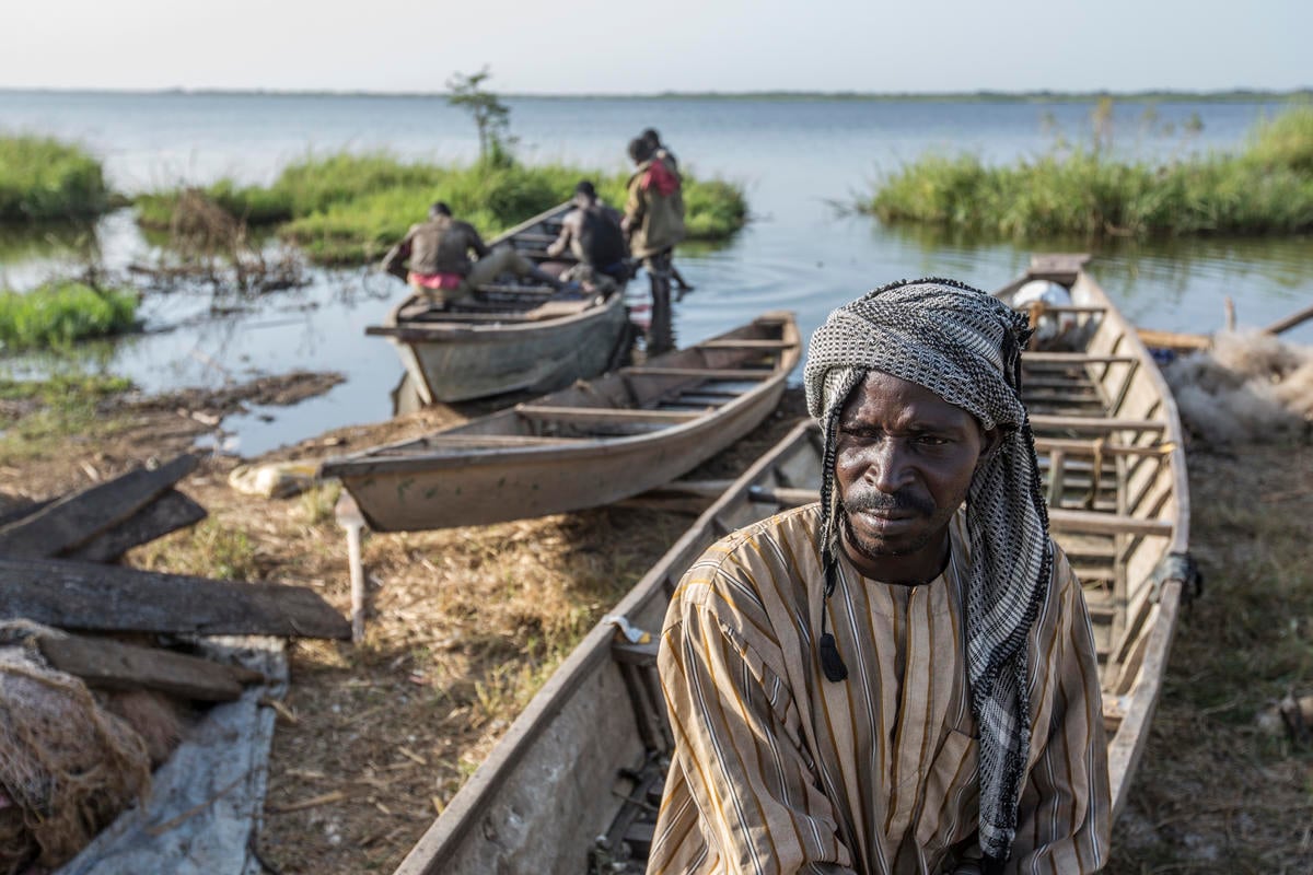Chad. Nigerian refugees join local fishing community on shores of Lake Chad