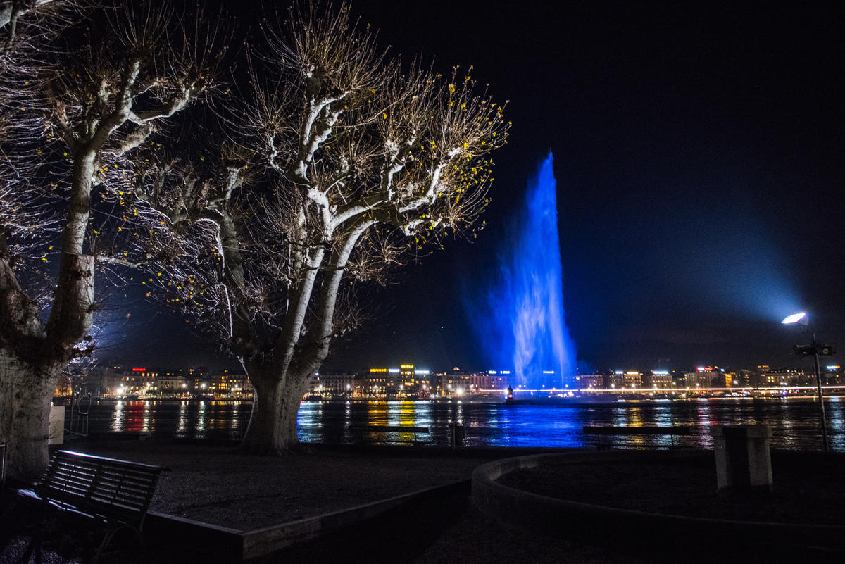 Switzerland. City of Geneva turns the Jet d'Eau blue in honour of the Global Refugee Forum