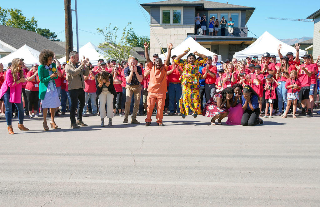 USA. Barobi Family sees their new home for the first time on the build site of Extreme Makeover: Home Edition.