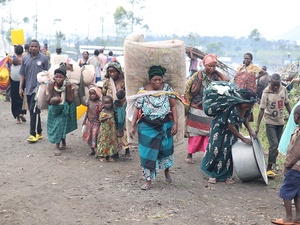 Mwamini Maheshe, 45, mother of 10 children, displaced from Sake arrives at Mugunga
