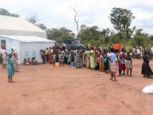 Angola. Parents waiting for the screening of their children