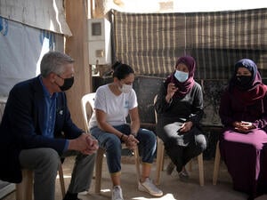 The High Commissioner for Refugees, Filippo Grandi, attending to Hind al-Hamad a 41 year old Syrian refugee, (the overseer of 3 camps) and Majida Shehada Ibrahim,36 years old Syrian refugee,(to the right of the image) while they explain what they need and what they are short of in the camp.