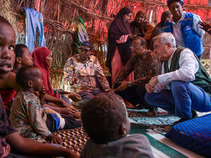 UN High Commissioner for Refugees Filippo Grandi visits a Somali family who recently arrived at a temporary site near Dagahaley refugee camp, Kenya.