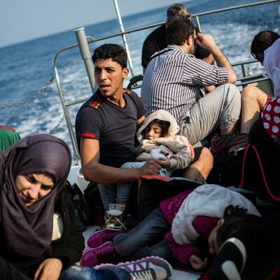 Syrian refugees on board a Hellenic Coast Guard vessel after being rescued in the Mediterranean sea, off the coast of Lesbos, Greece.