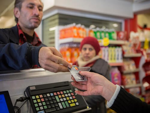 Greece. For Syrian refugees cash cards are an invaluable lifeline