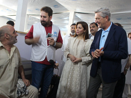 Pakistan. Goodwill Ambassador, Mahira Khan, observes as Afghan refugees go through resettlement process. 