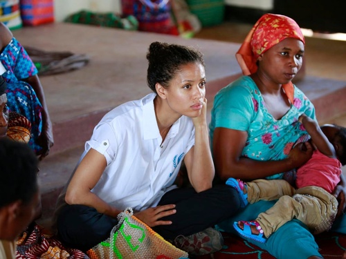 Uganda. UNHCR Supporter Gugu Mbatha-Raw at the Women's Centre in Nakivale Refugee Settlement, with Sifa Semeki, a refugee.