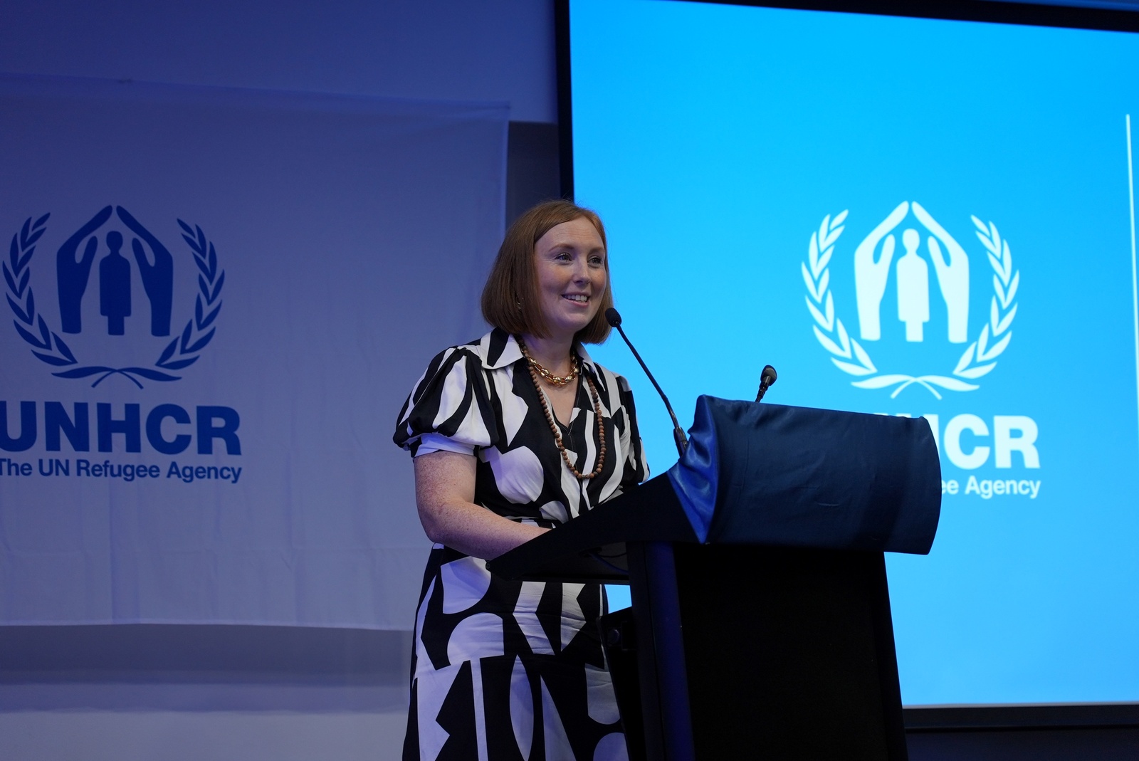 Cate Martin from DLA Piper gives a speech