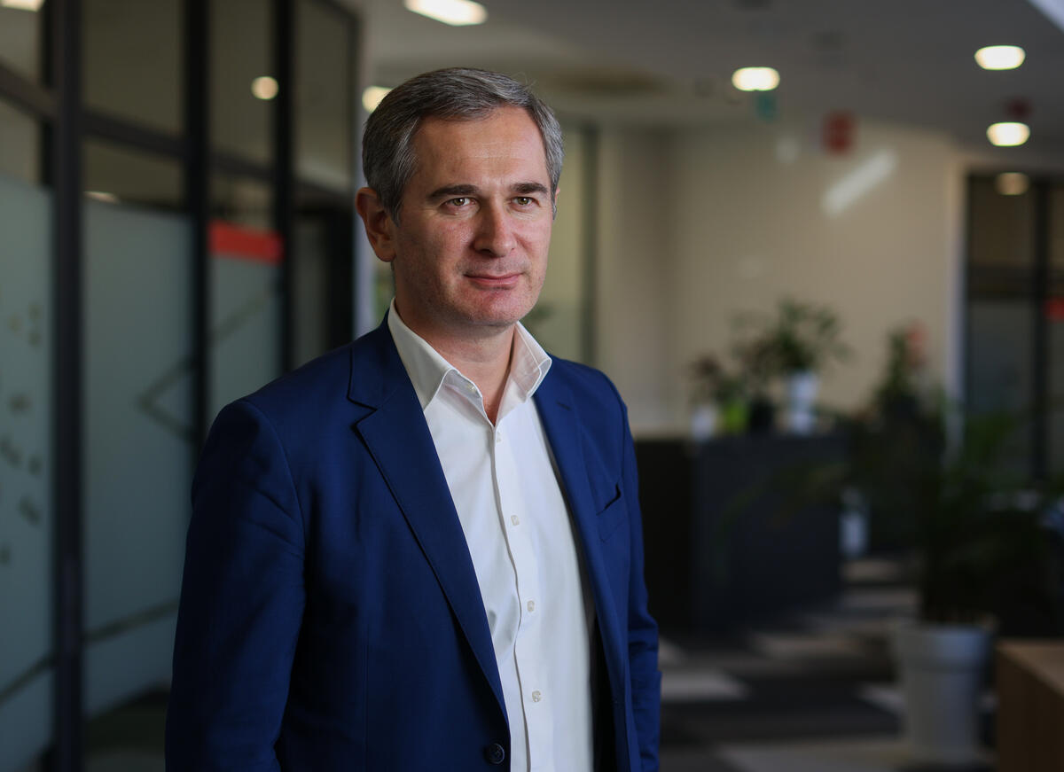 A man standing in his office
