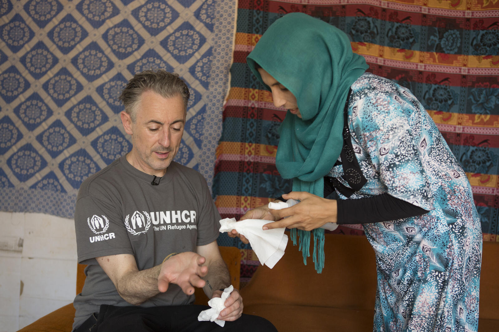 Lebanon. UNHCR High Profile Supporter Alan Cumming meets Syrian refugee Mzyed Haj Khalaf and his family at Rass Maska informal settlement