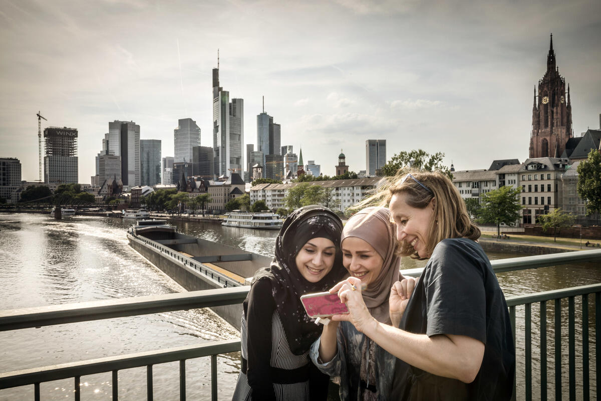 Germany. Refugee women got a job as a seamstress in a Frankfurt fashion workshop.